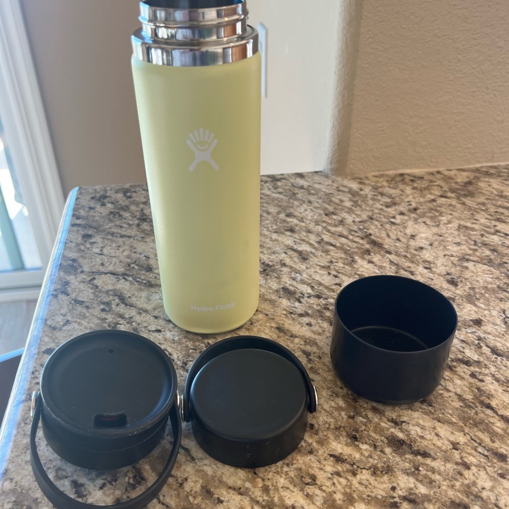 Light neon yellow hydro flask with accessories